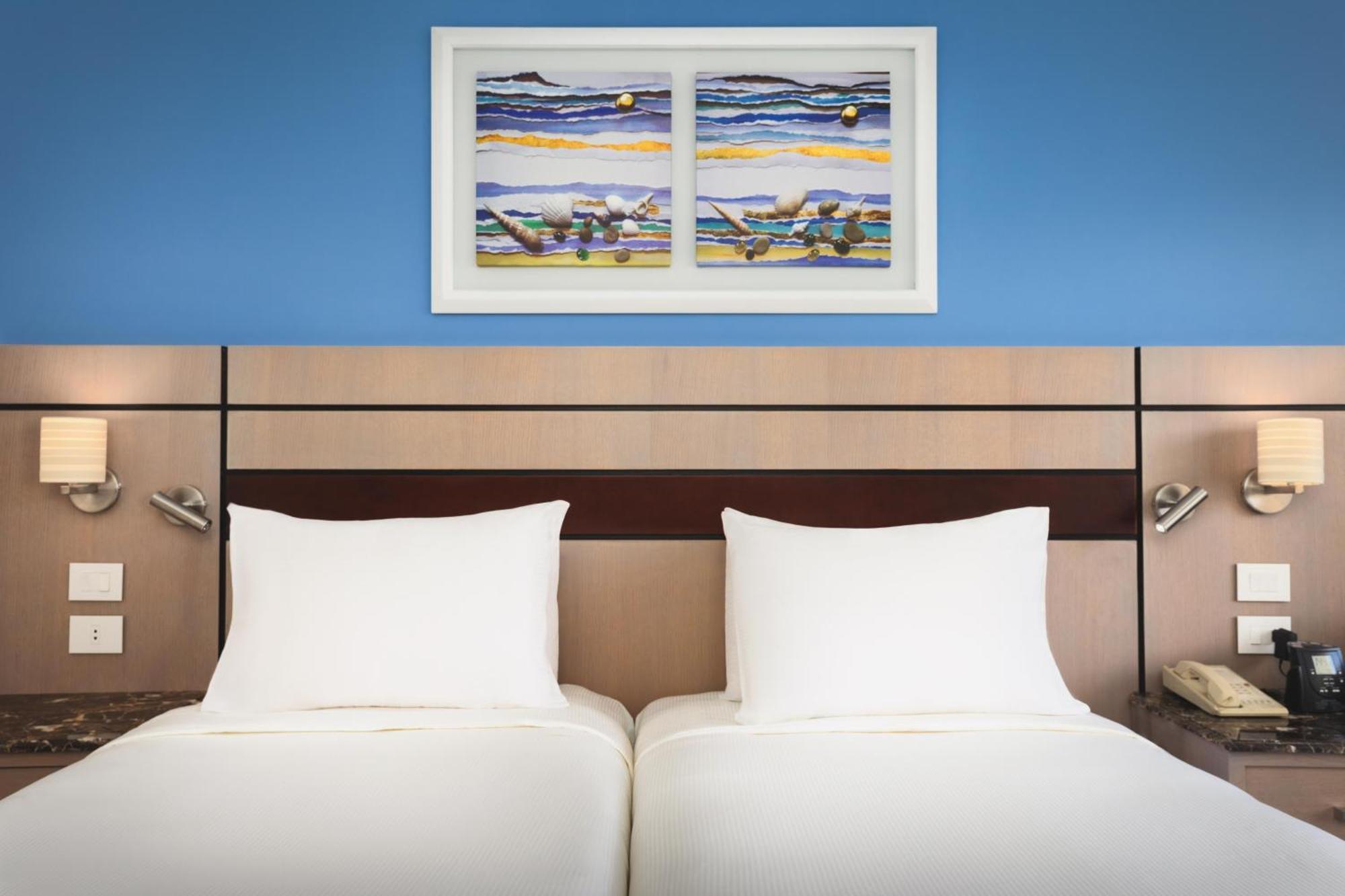 Premium tweepersoonskamer met uitzicht op zee.